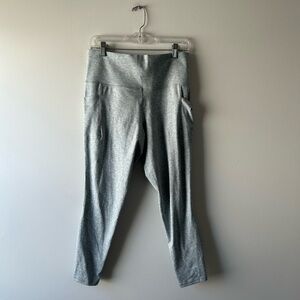 Athleta green melange Salutation stash pocket athletic leggings